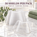 Stack of clear lash shower shields on a marble counter, 50 per pack